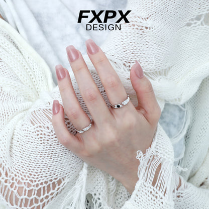 Elegant FXPX secret bond couple rings featuring unique designs, perfect for celebrating love and connection