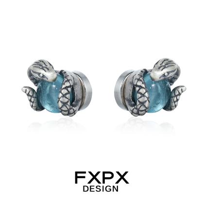 FXPX serpent ear cuffs featuring intricate snake design with a blue gemstone for a unique look