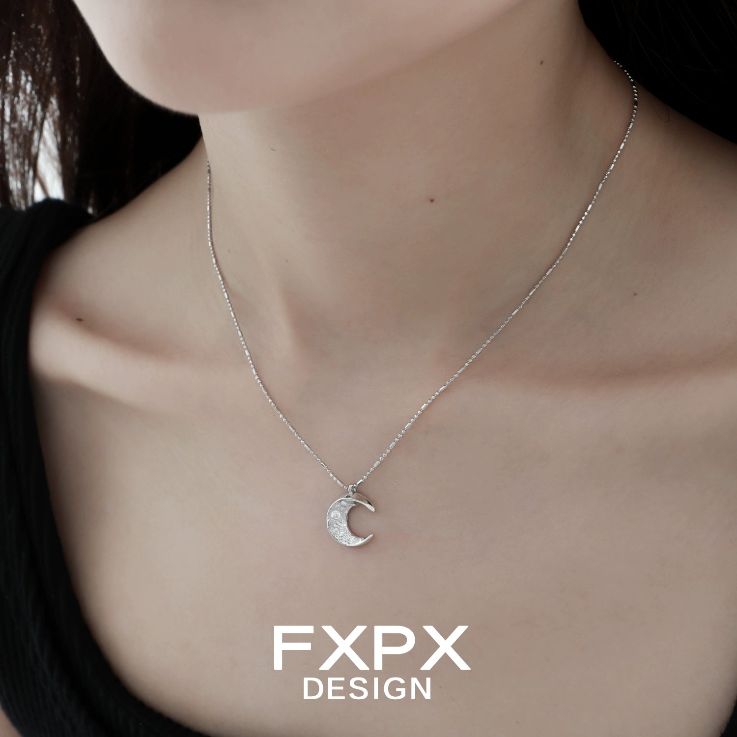 FXPX Shattered Moonlight Zircon Necklace with delicate crescent moon pendant on a silver chain