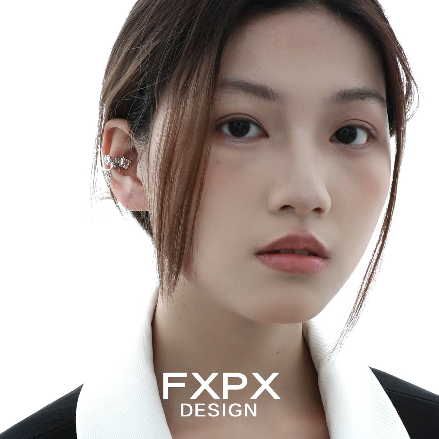 Stylish shattered prism zircon ear cuff by FXPX worn elegantly on a model
