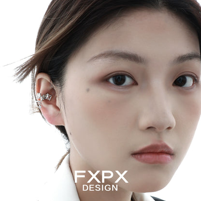 Model wearing shattered prism zircon ear cuff showcasing stylish and modern design