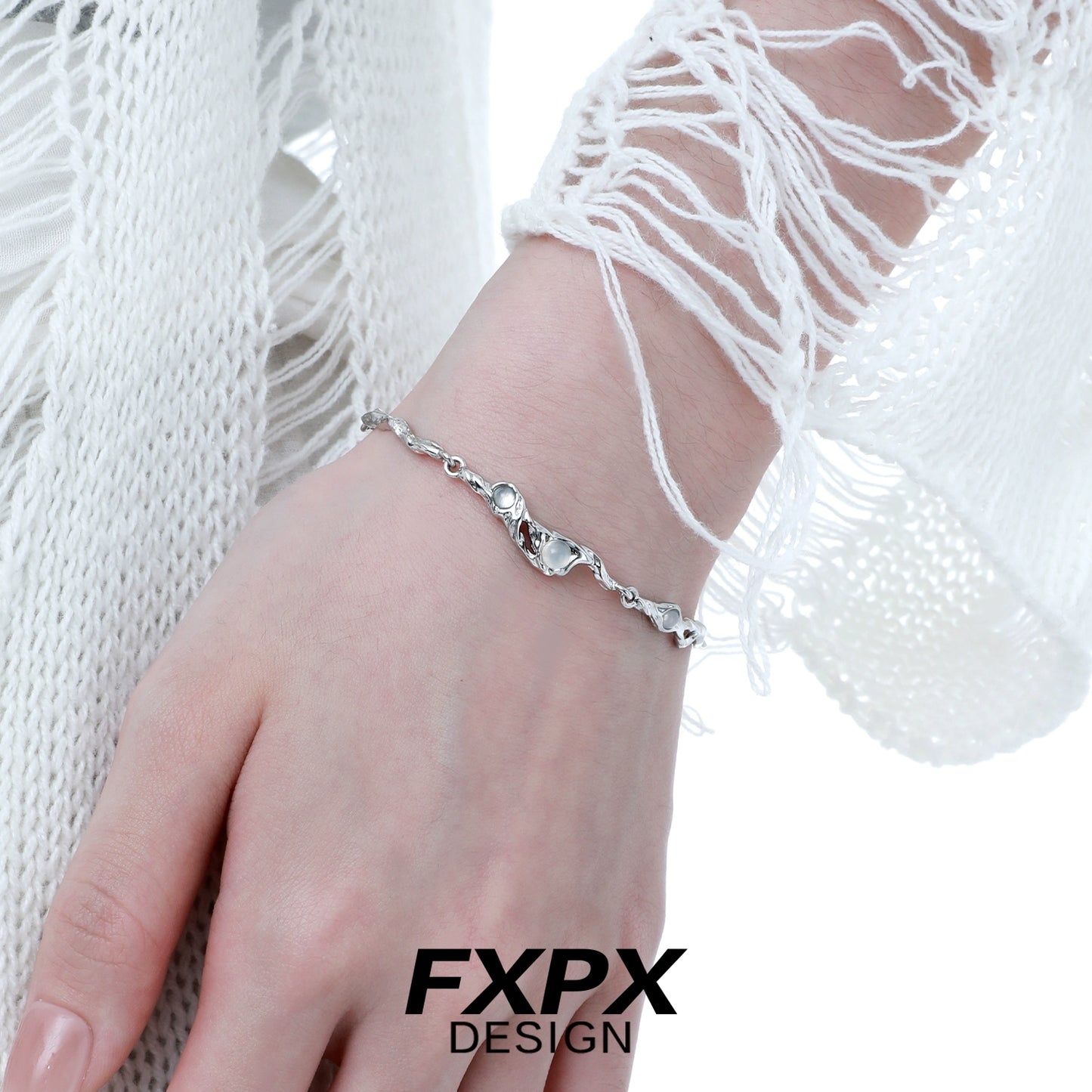 Elegant FXPX silver bracelet for women featuring intricate designs and a comfortable fit