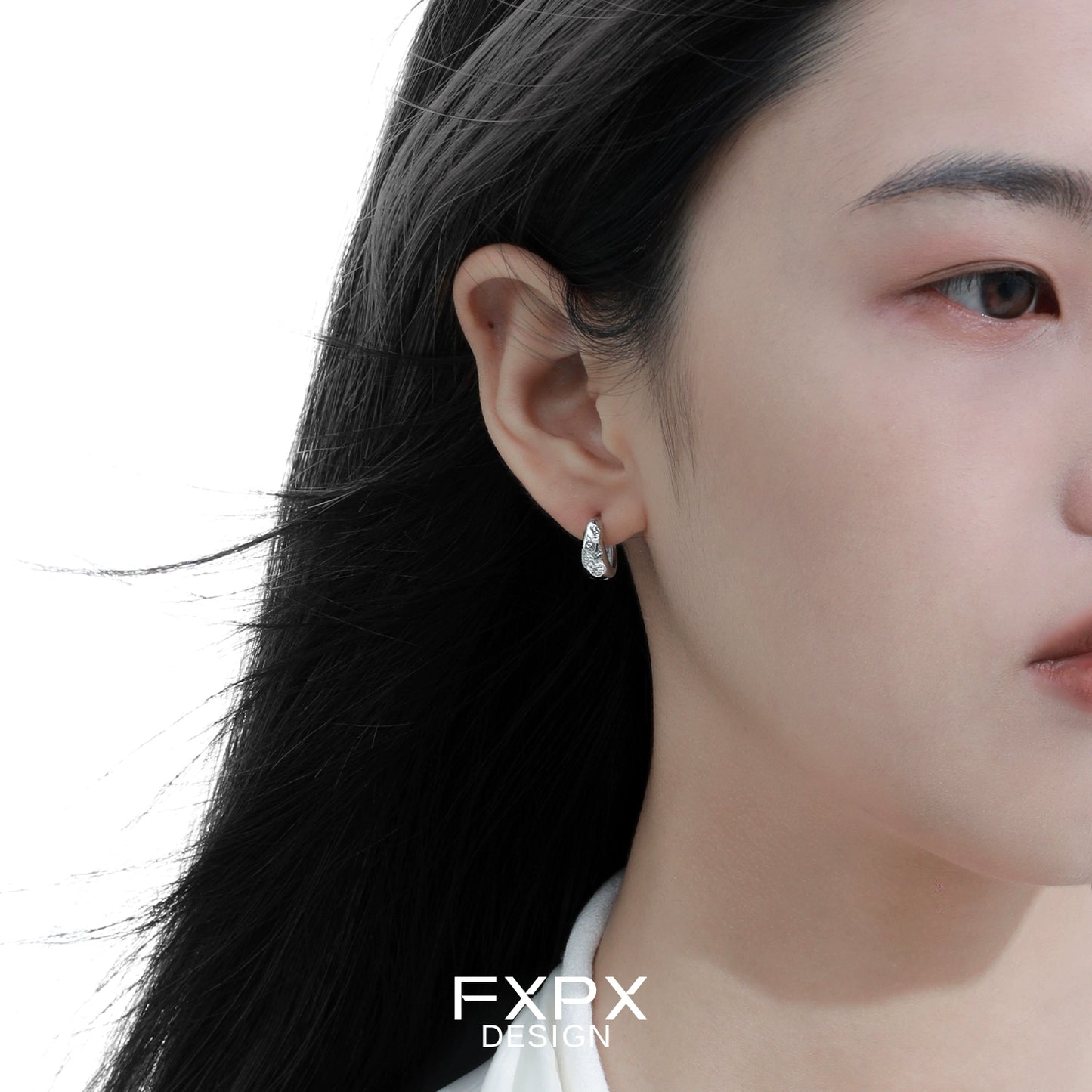 Elegant FXPX silver ear clips for women featuring a modern design suitable for any occasion