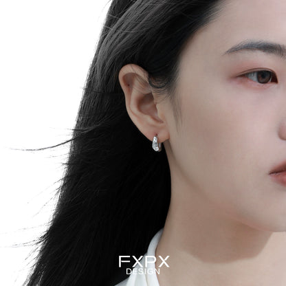 Elegant FXPX silver ear clips for women featuring a modern design suitable for any occasion