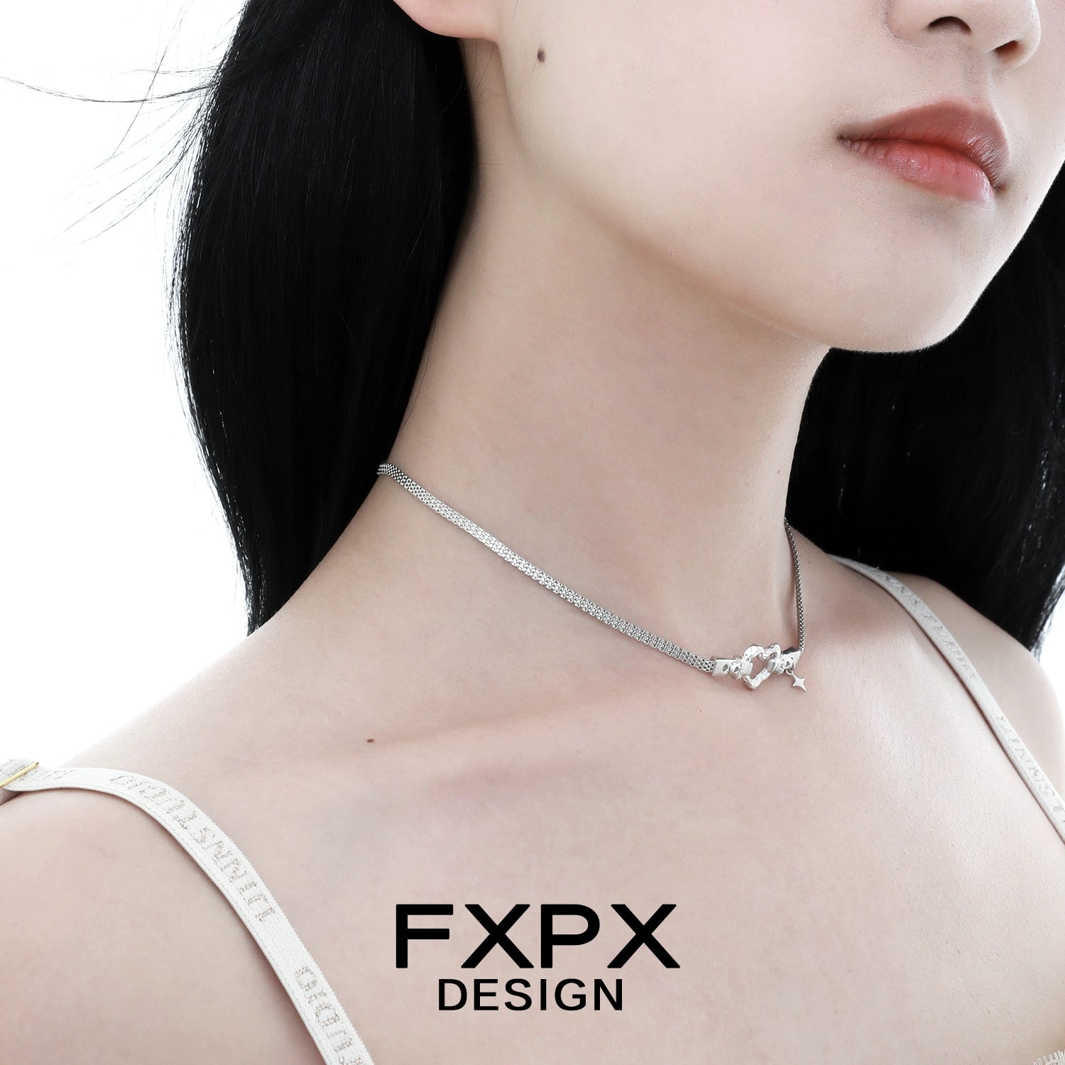FXPX silver heart belt necklace elegantly worn by a model showcasing its stylish design