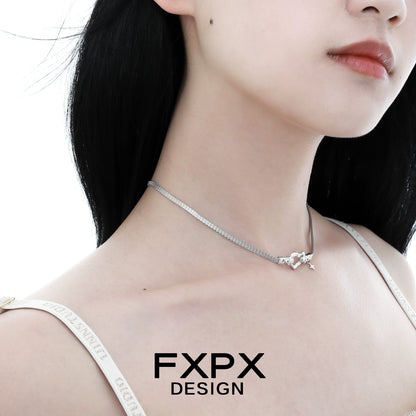 FXPX silver heart belt necklace elegantly worn by a model showcasing its stylish design