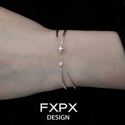 FXPX silver star bracelet featuring a sleek design with star accents on a stylish cuff