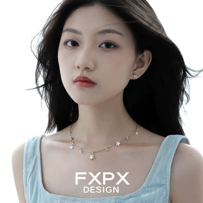 Elegant FXPX silver star necklace featuring shimmering star-shaped charms on a delicate chain