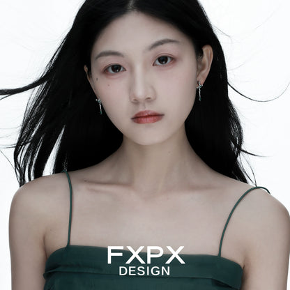 Elegant FXPX snake cross earrings featuring a unique design for stylish accessories