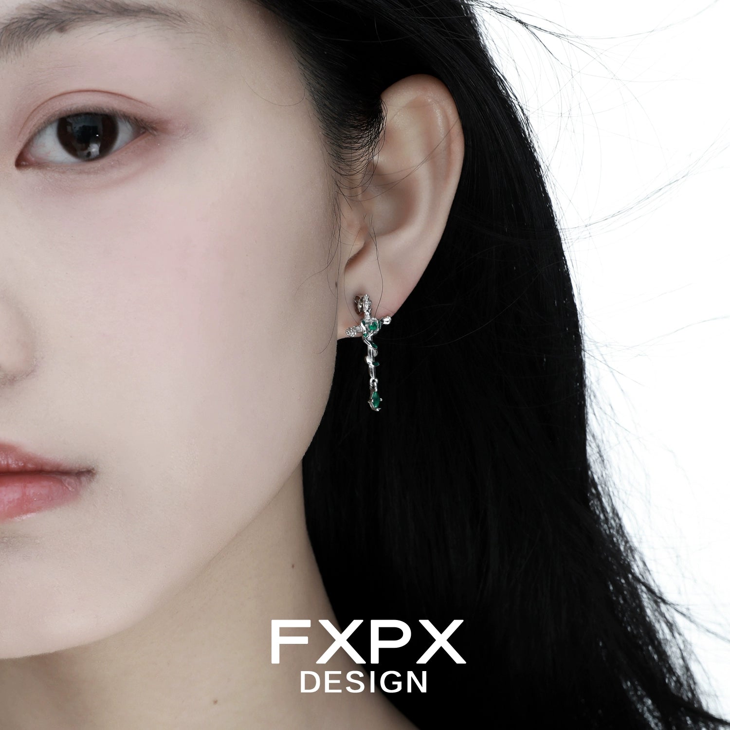 Fashionable snake cross earrings designed by FXPX with intricate details and a modern look