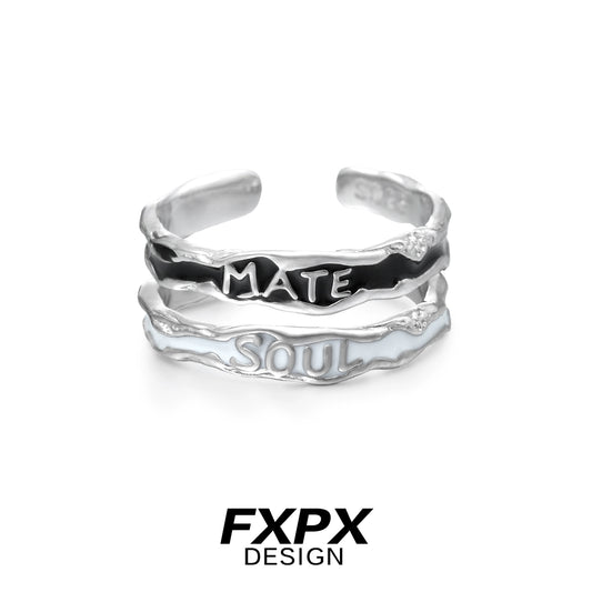 FXPX soulmate engraved ring featuring a unique wavy design and contrasting black and white text