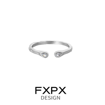 FXPX star gaze couple rings in silver featuring elegant teardrop design with shimmering stones