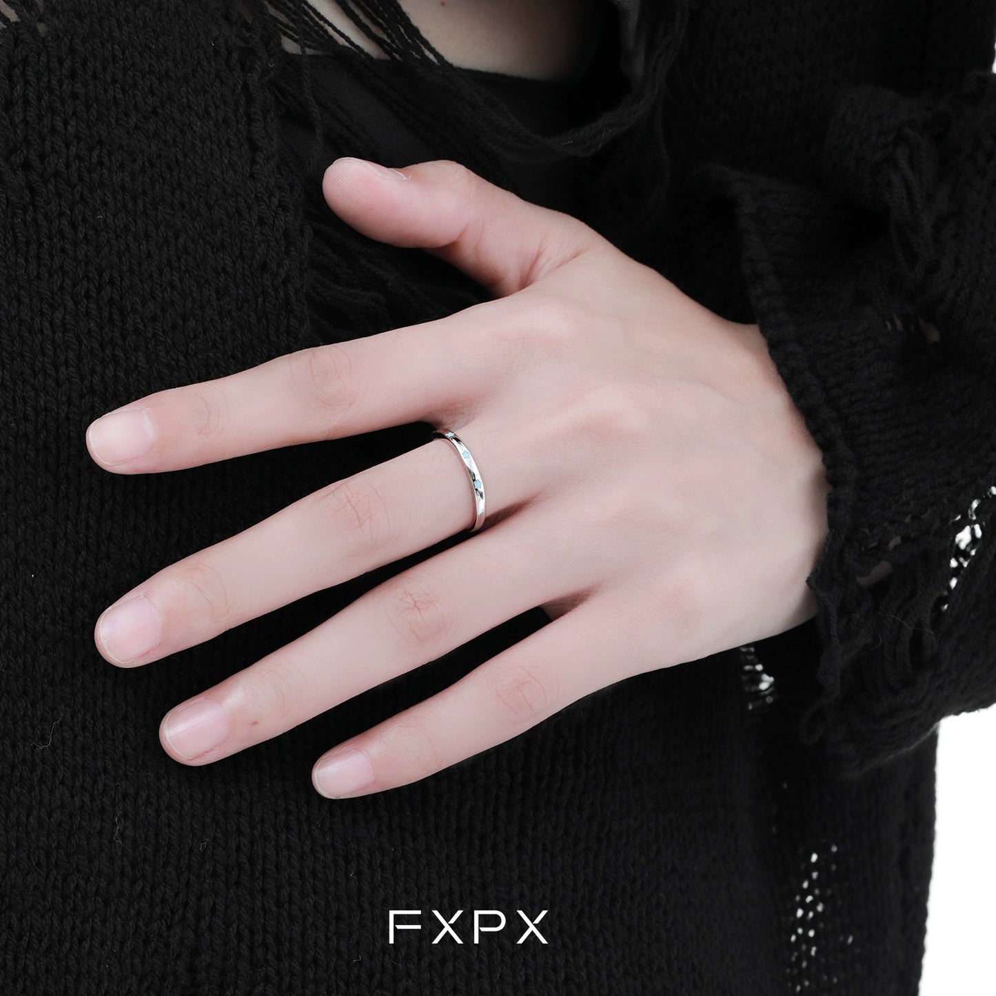Elegant FXPX star ring for women featuring a sleek silver design for stylish everyday wear