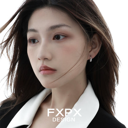Elegant star silver earrings by FXPX showcasing a stylish and modern design