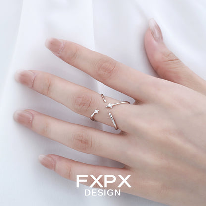 Delicate FXPX star silver ring on a hand, ideal for adding a touch of elegance to your jewelry collection