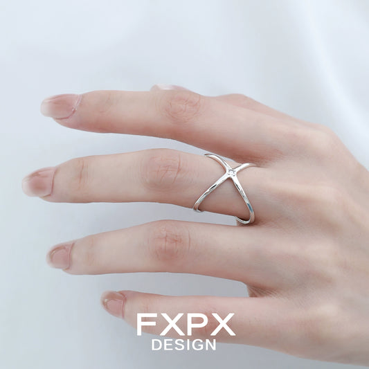 Elegant FXPX star silver ring showcased on a hand with a minimalist design