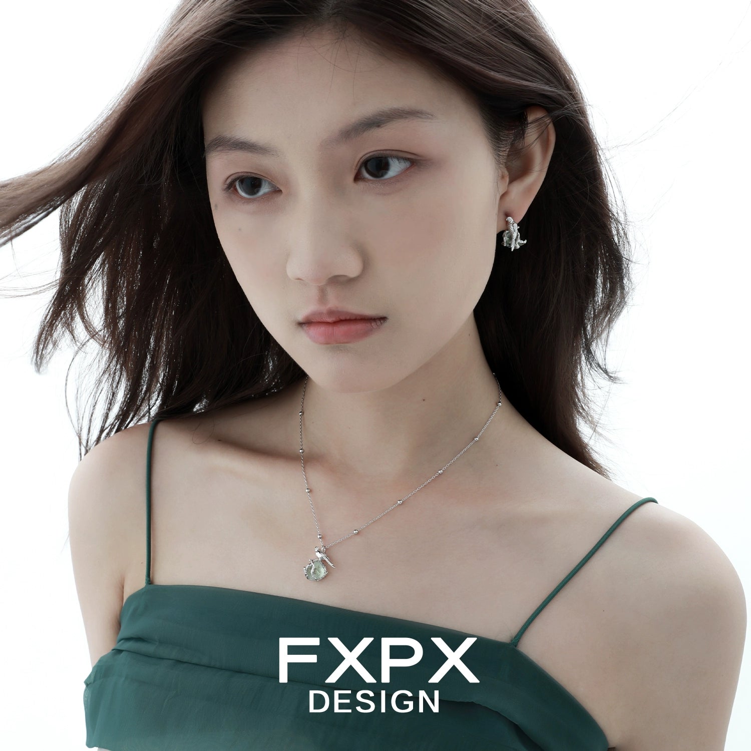 Model wearing a swallow fluorite silver necklace that adds elegance to any outfit