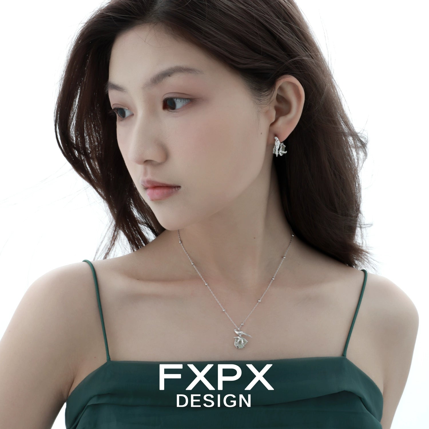 Swallow fluorite silver necklace showcased on model wearing elegant attire