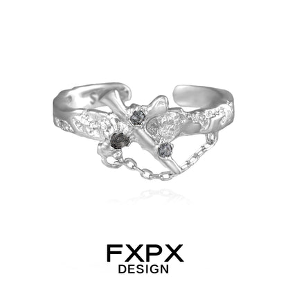FXPX silver sword cross ring featuring intricate design and decorative stones