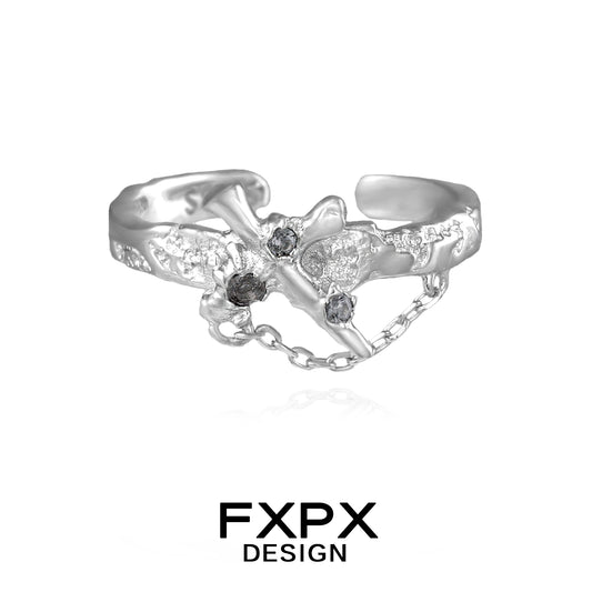 FXPX silver sword cross ring featuring intricate design and decorative stones