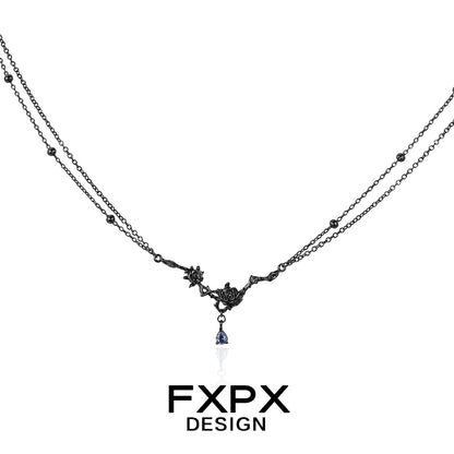 Elegant FXPX Tanzanian blue black rose necklace with layered chains and a dangling charm