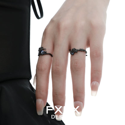 Elegant FXPX Tanzanian blue rose ring showcased on model's fingers for a stylish look