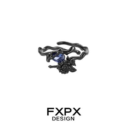 FXPX Tanzanian blue rose ring featuring an elegant design with a stunning blue gemstone