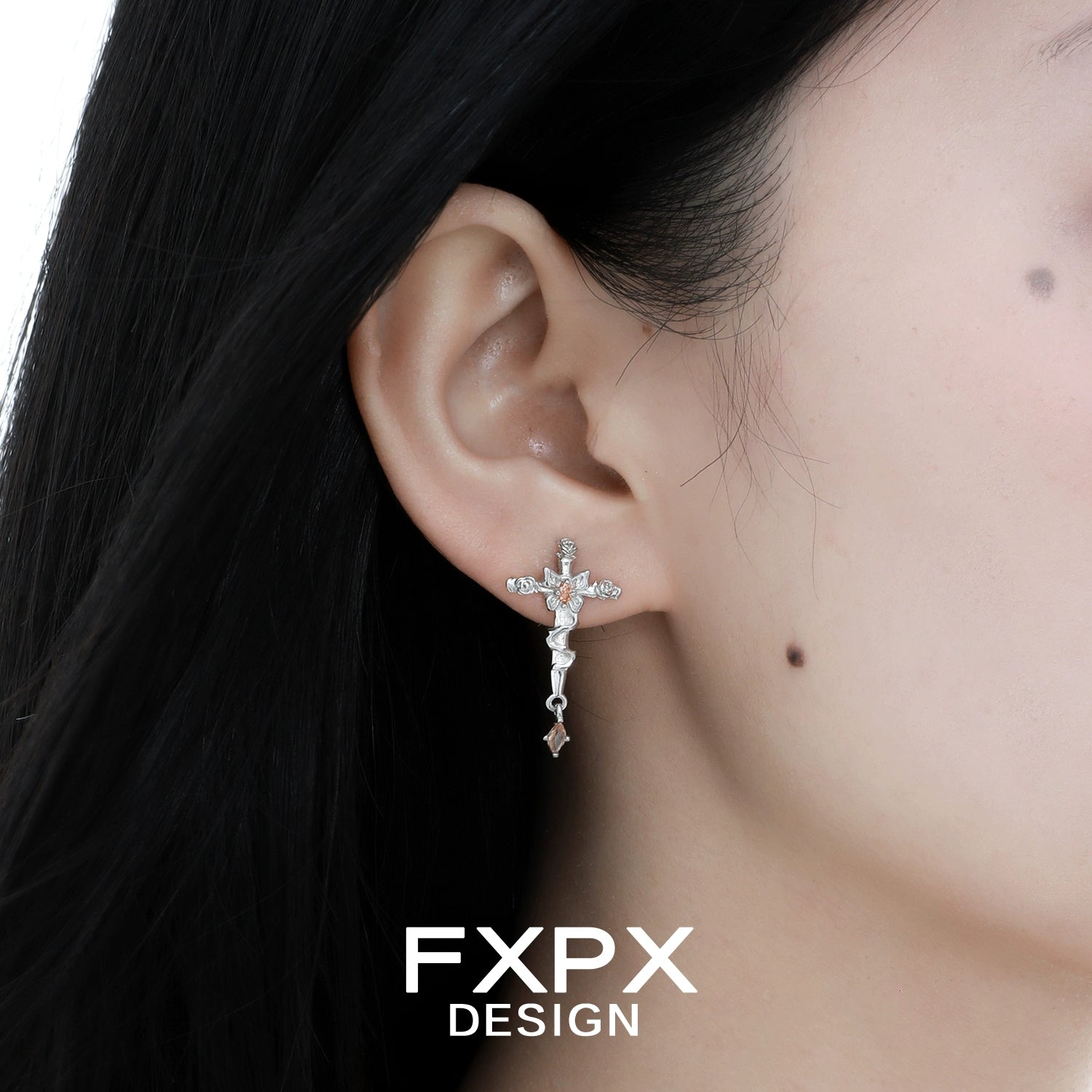 Stylish FXPX thorned butterfly cross earrings featuring sparkling accents and unique design