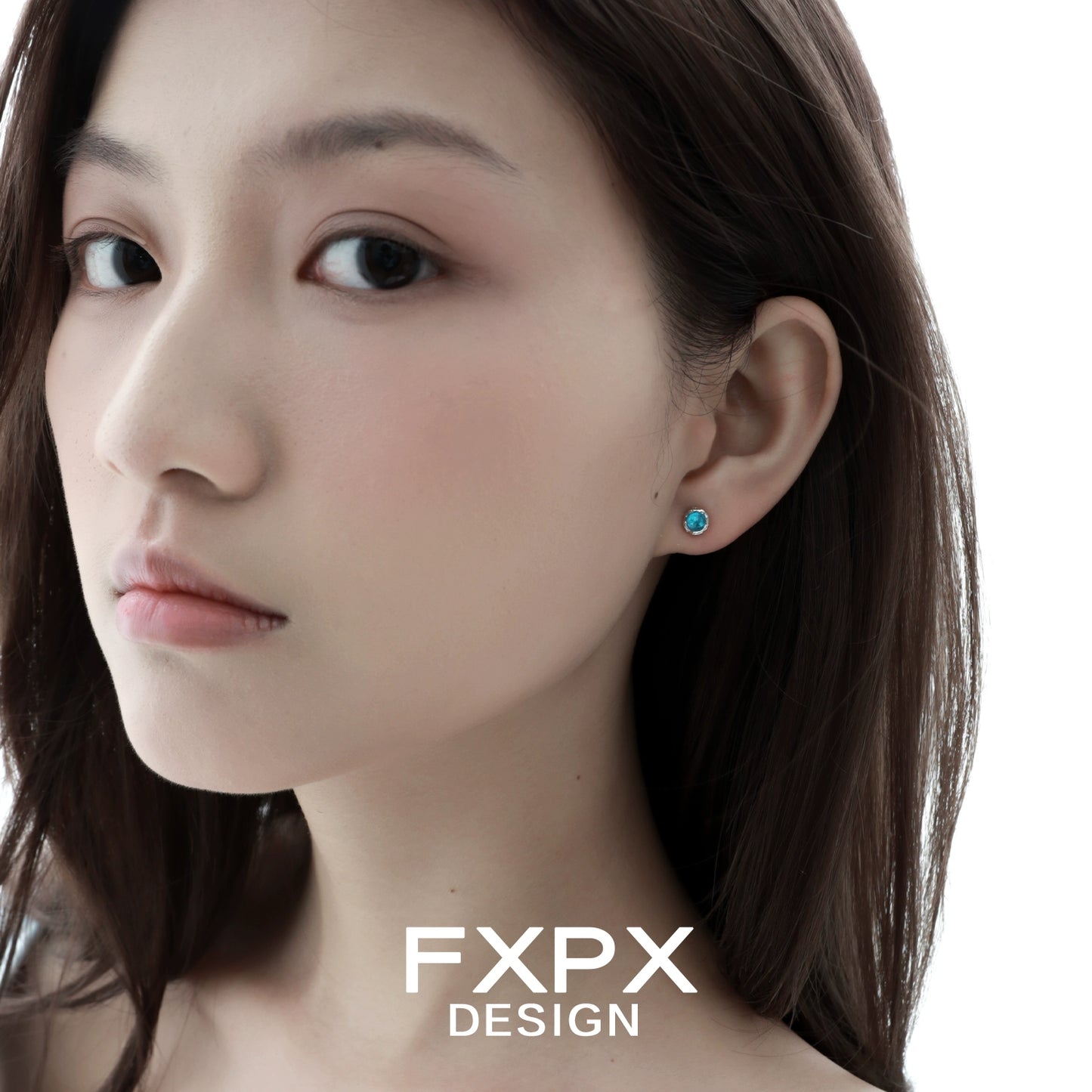 Turquoise blue screw stud earrings showcased on model's ear for a stylish look