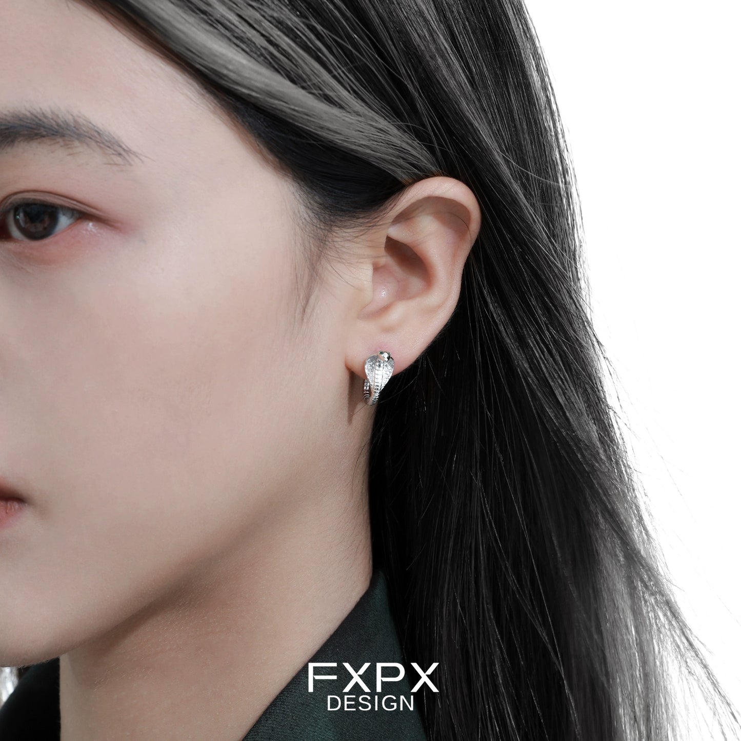 FXPX unique serpent earrings for women displayed on a model's ear, showcasing elegant design