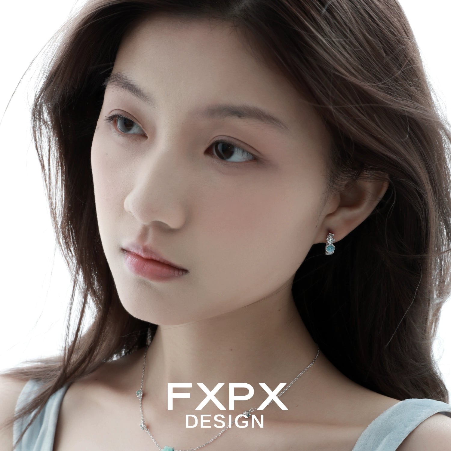 FXPX Vintage Blue Rose Earrings Sparkling Design Worn by Model Highlighting Elegance