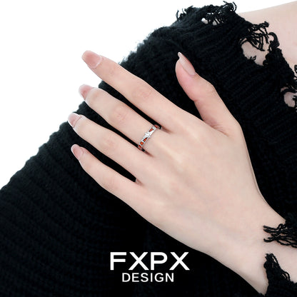 Elegant hand wearing a vintage checkerboard star ring showcasing a unique design and artistry