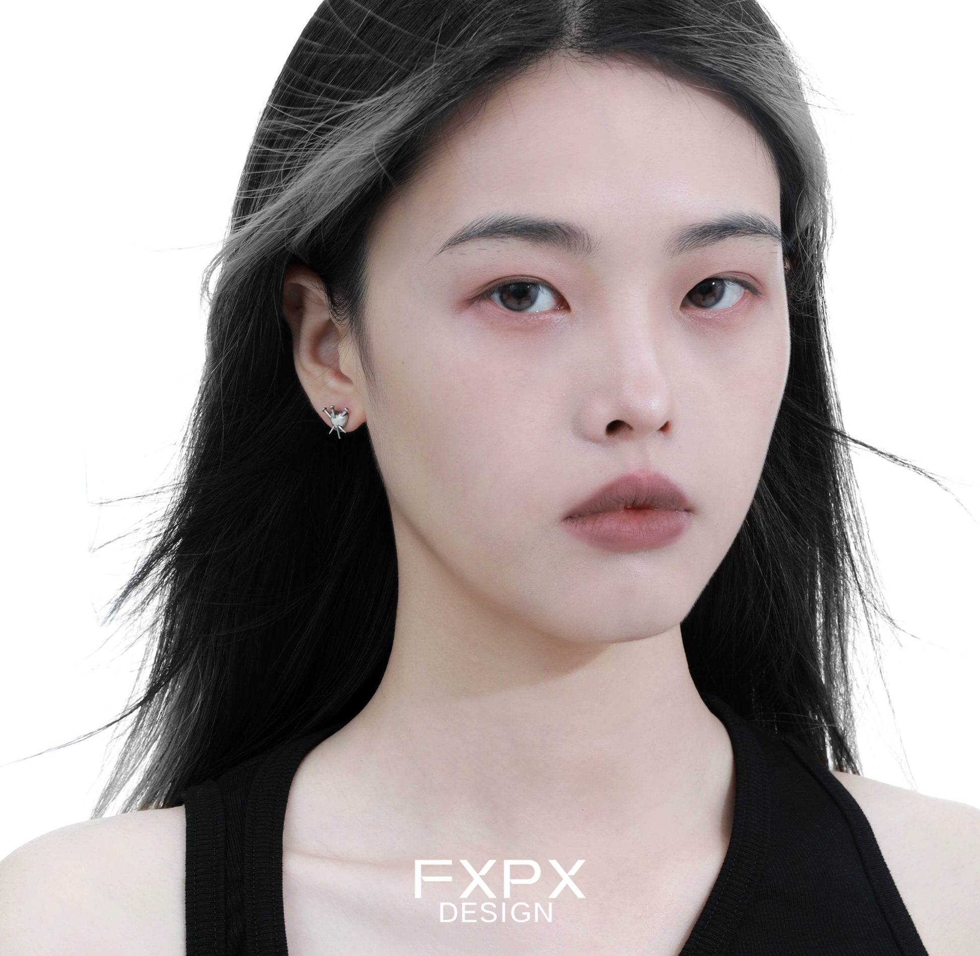 Stylish vintage punk silver earrings showcased on a model with long black hair