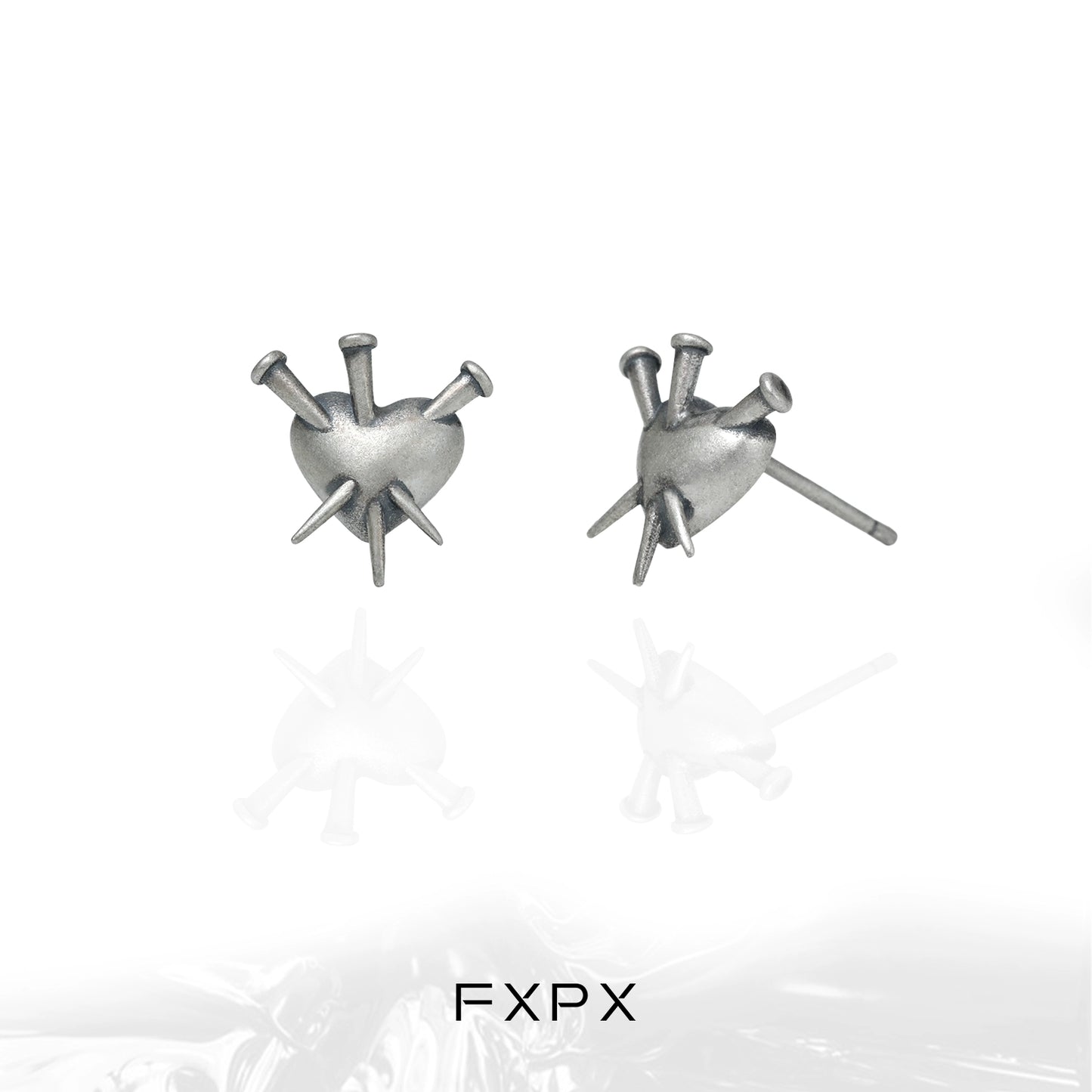 FXPX vintage punk silver earrings featuring a heart design with spikes for a bold look