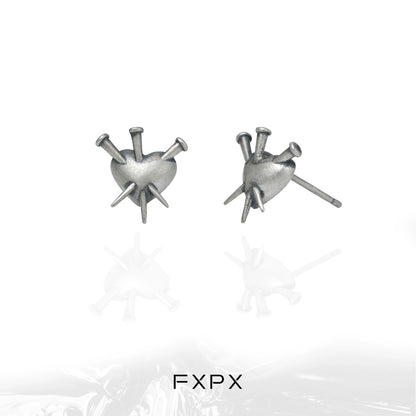 FXPX vintage punk silver earrings featuring a heart design with spikes for a bold look