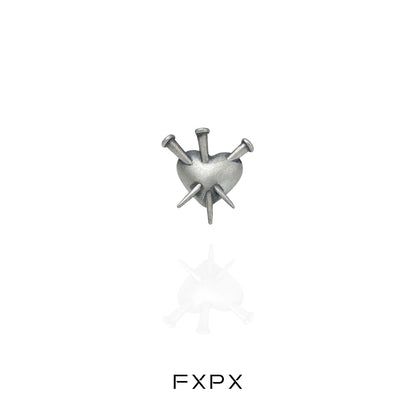 Vintage punk silver earrings featuring a heart design with spikes for a bold accessory