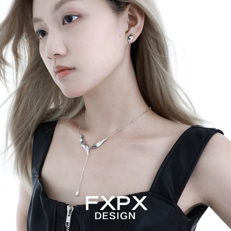 Y2K black feather necklace elegantly displayed on a model with stylish earrings