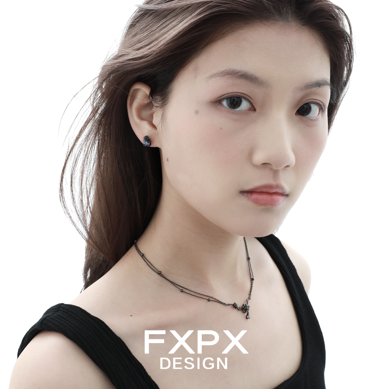 Model wearing Y2K blue rose earrings showcasing a trendy and stylish floral design
