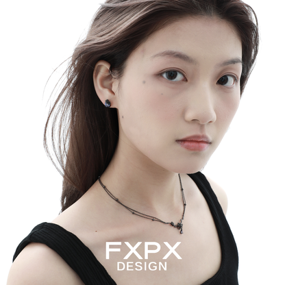Model wearing Y2K blue rose earrings showcasing a trendy and stylish floral design