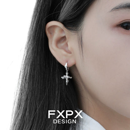 Stylish y2k cross earrings featuring a delicate cross design, perfect for trendy outfits