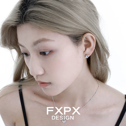 Stylish FXPX Y2K moonstone earrings worn by a model with short hair