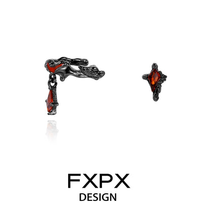 FXPX Y2K orange stud earrings with unique black detailing and orange gemstones
