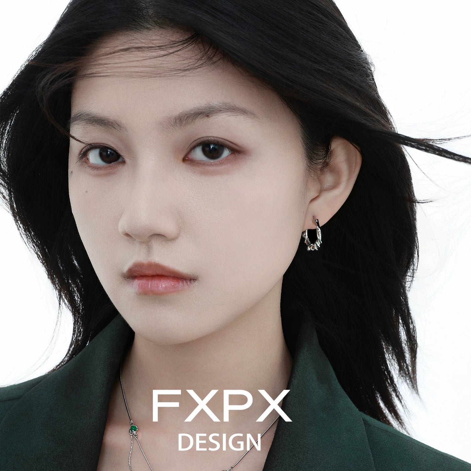 Model wearing Y2K ouroboros earrings showcasing a unique design and modern aesthetic