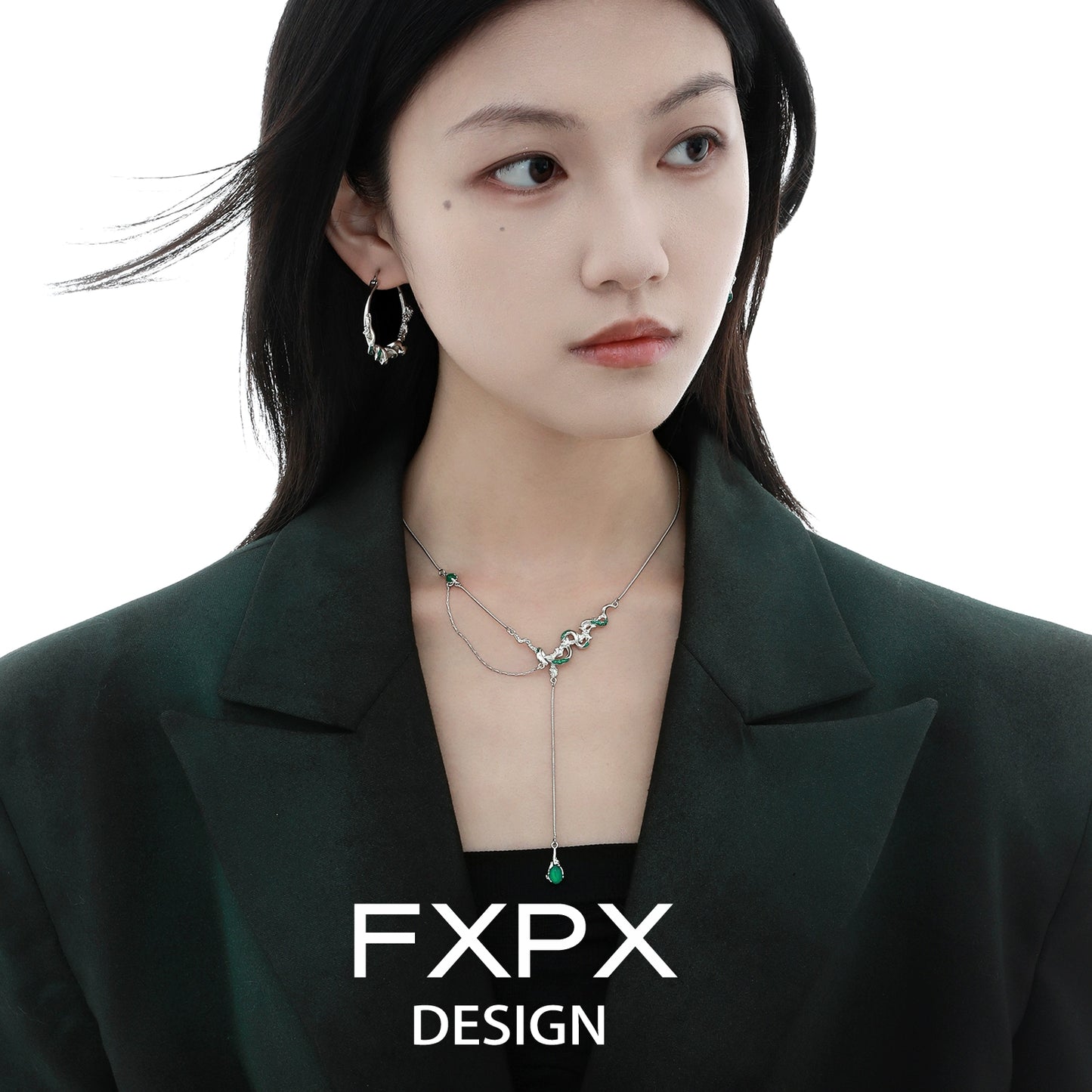 FXPX Y2K ouroboros earrings showcased on a model wearing a stylish outfit