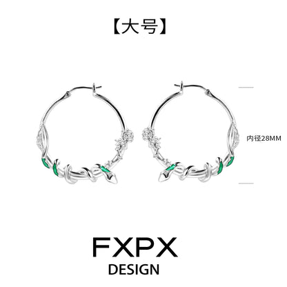 FXPX Y2K ouroboros earrings with silver finish and green accents for a trendy look