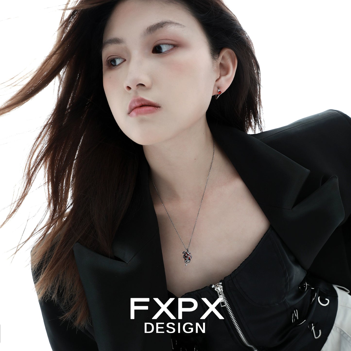 Model wearing an FXPX Y2K rose snake necklace in silver, complementing a stylish outfit.