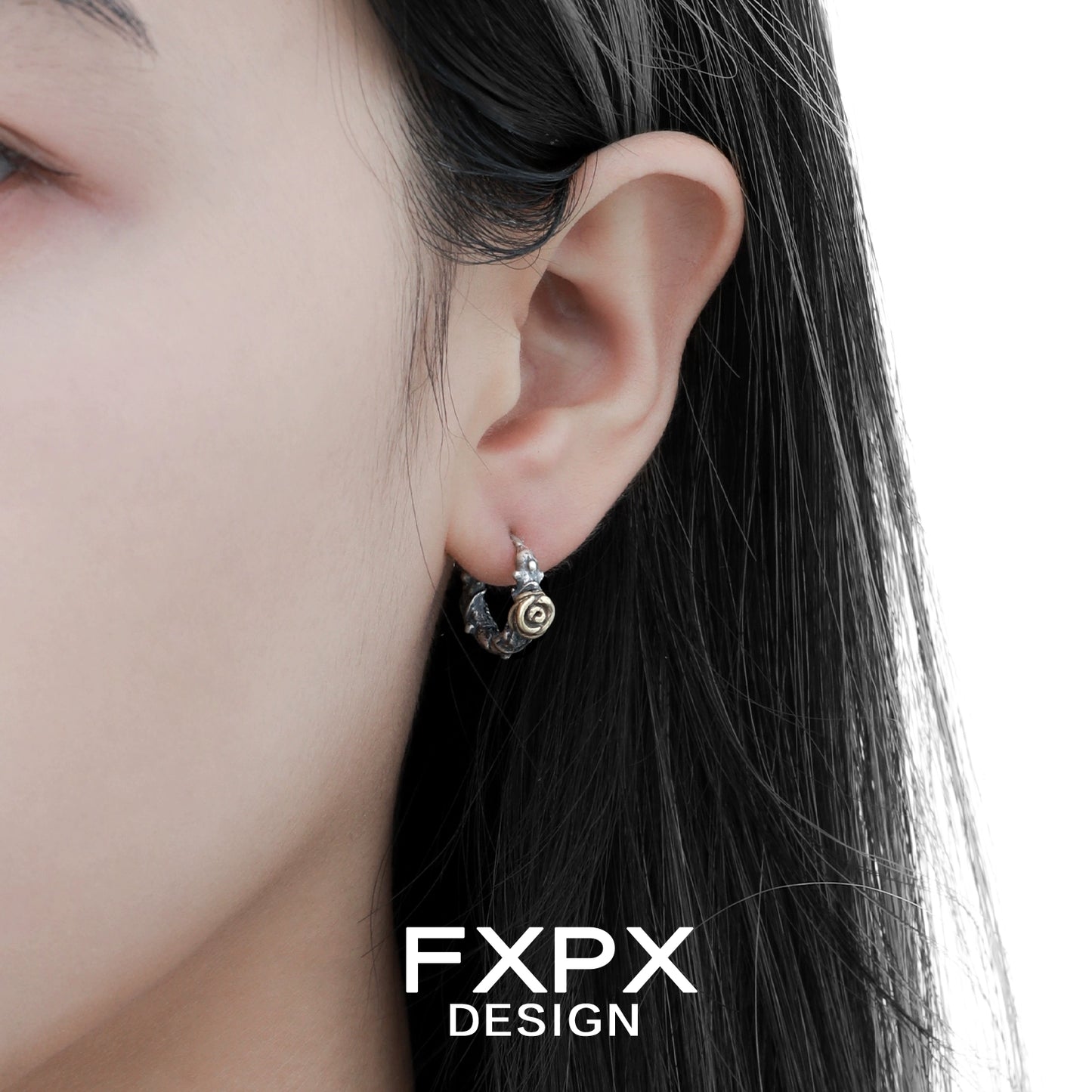 Close-up of a person wearing Y2K rose vintage earrings with intricate design and a stylish look