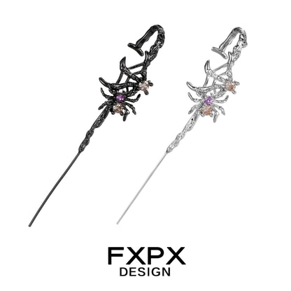 Y2K spider ear piercing jewelry featuring black and silver designs with colorful embellishments