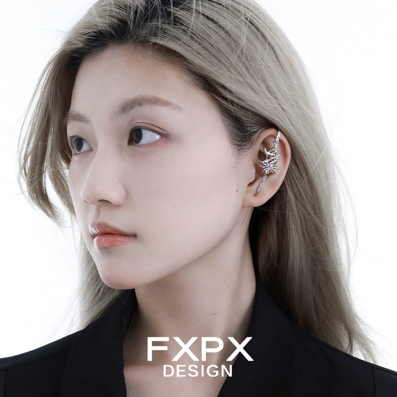 Y2K spider ear piercing jewelry by FXPX featuring a stylish and unique design