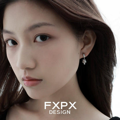 Stylish FXPX Y2K star earrings featuring a unique design, perfect for trendy outfits